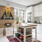 Elegancia en revestimientos, con ladrillo visto y cemento pulido